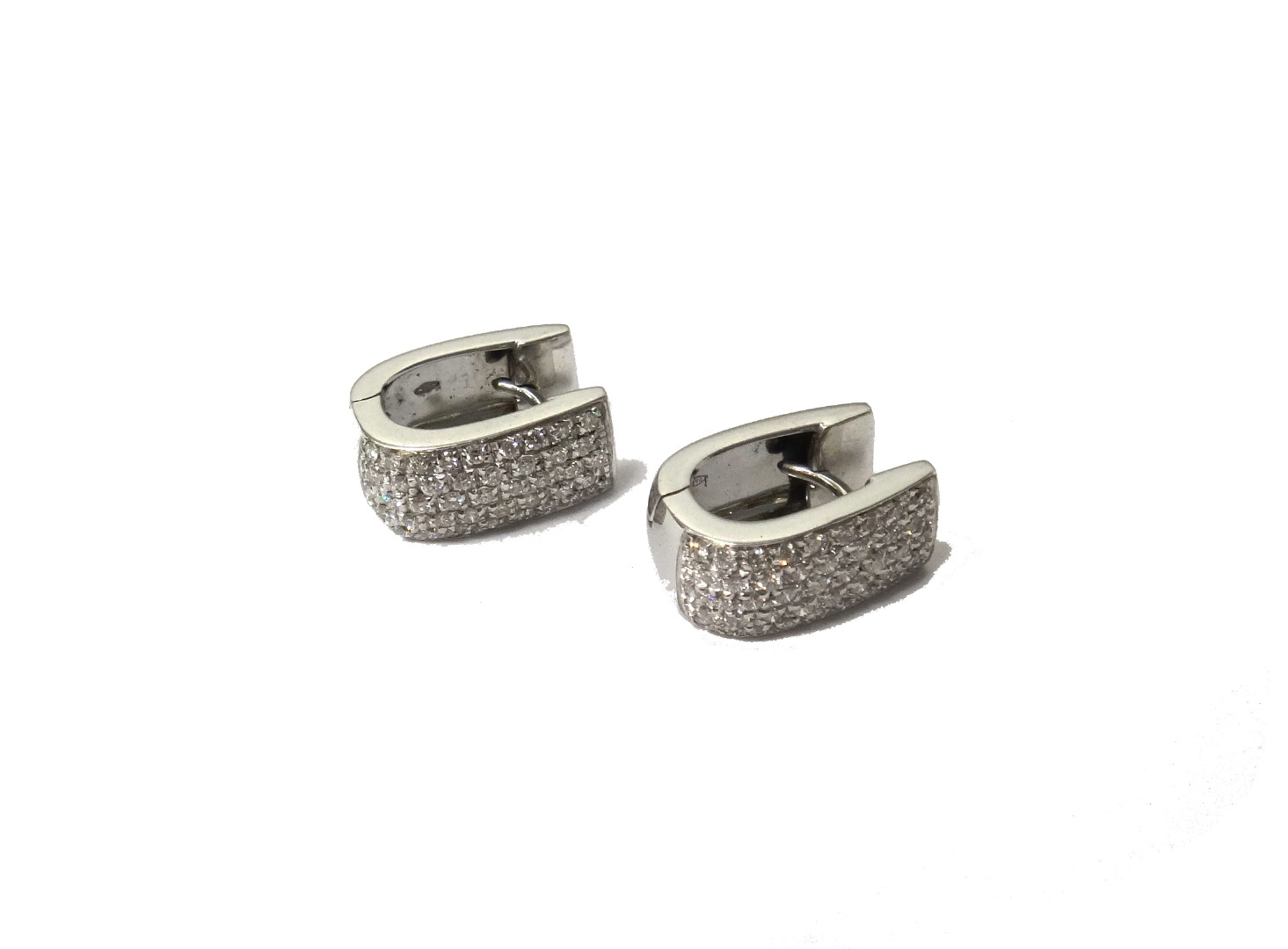 Appraisal: A pair of ct white gold and diamond set earclips