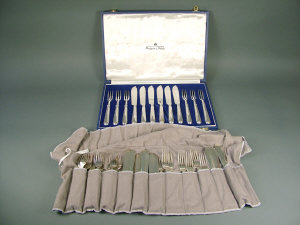 Appraisal: A cased set of Mappin and Webb silver fish eaters