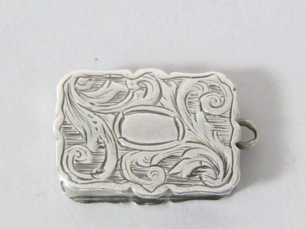 Appraisal: A Victorian small rectangular Pendant Vinaigrette with leafage scroll engraving