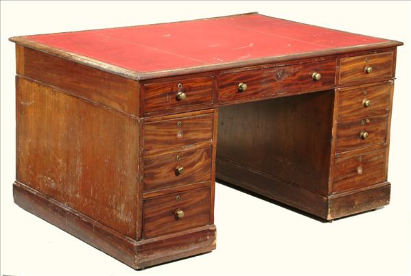 Appraisal: A Victorian mahogany partners desk circa with nine drawers to