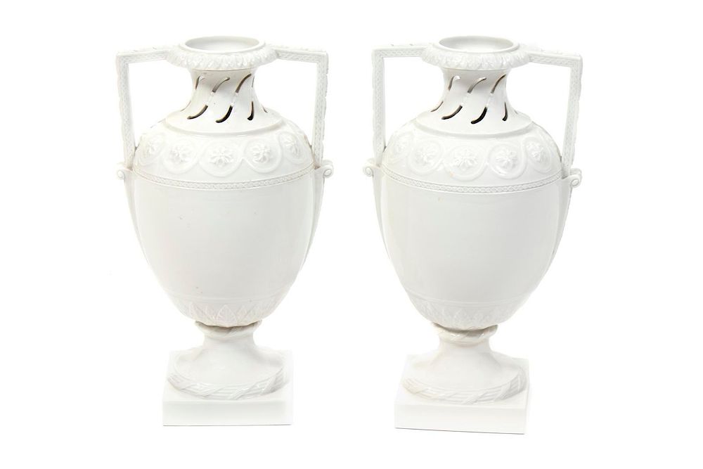 Appraisal: A Pair of KPM Blanc-de-Chine Porcelain Urns Height inches A