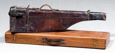 Appraisal: Two gun cases one leather with two-initial monogram in creases