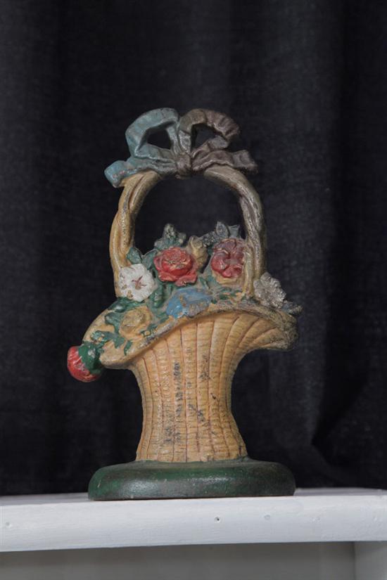 Appraisal: FLOWER BASKET CAST IRON DOORSTOP Polychrome painted door stop having