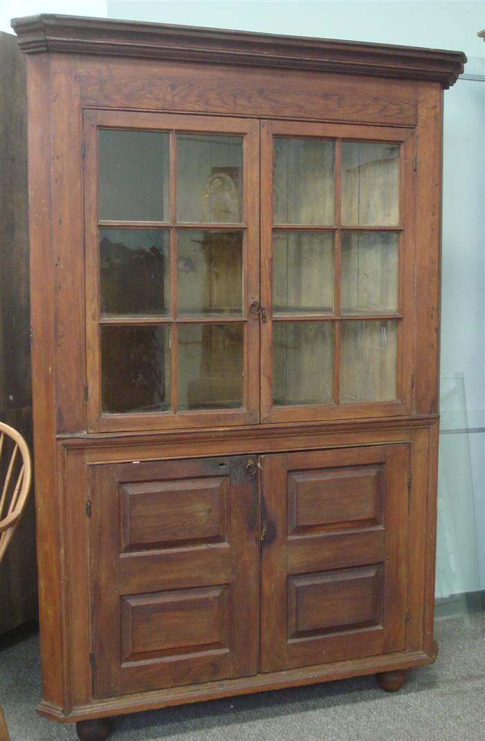 Appraisal: th c yellow pine corner cupboard one piece six pane