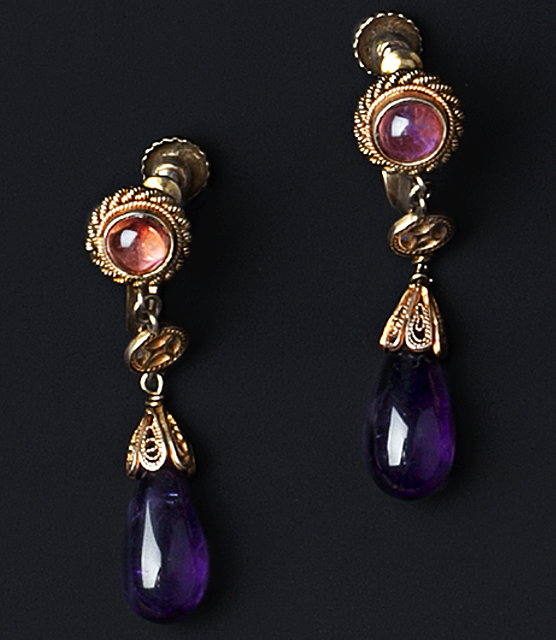 Appraisal: A PAIR OF AMETHYST SET EAR PENDANTS each tear-shaped amethyst