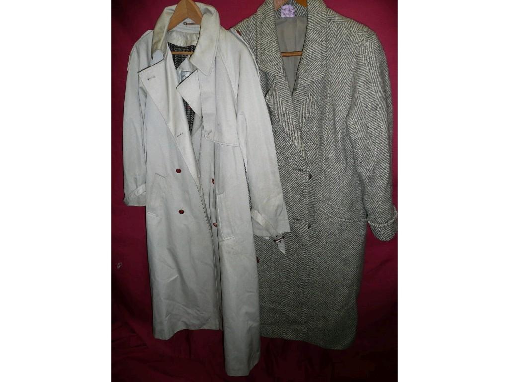 Appraisal: A cream trench coat and a vintage style herringbone winter