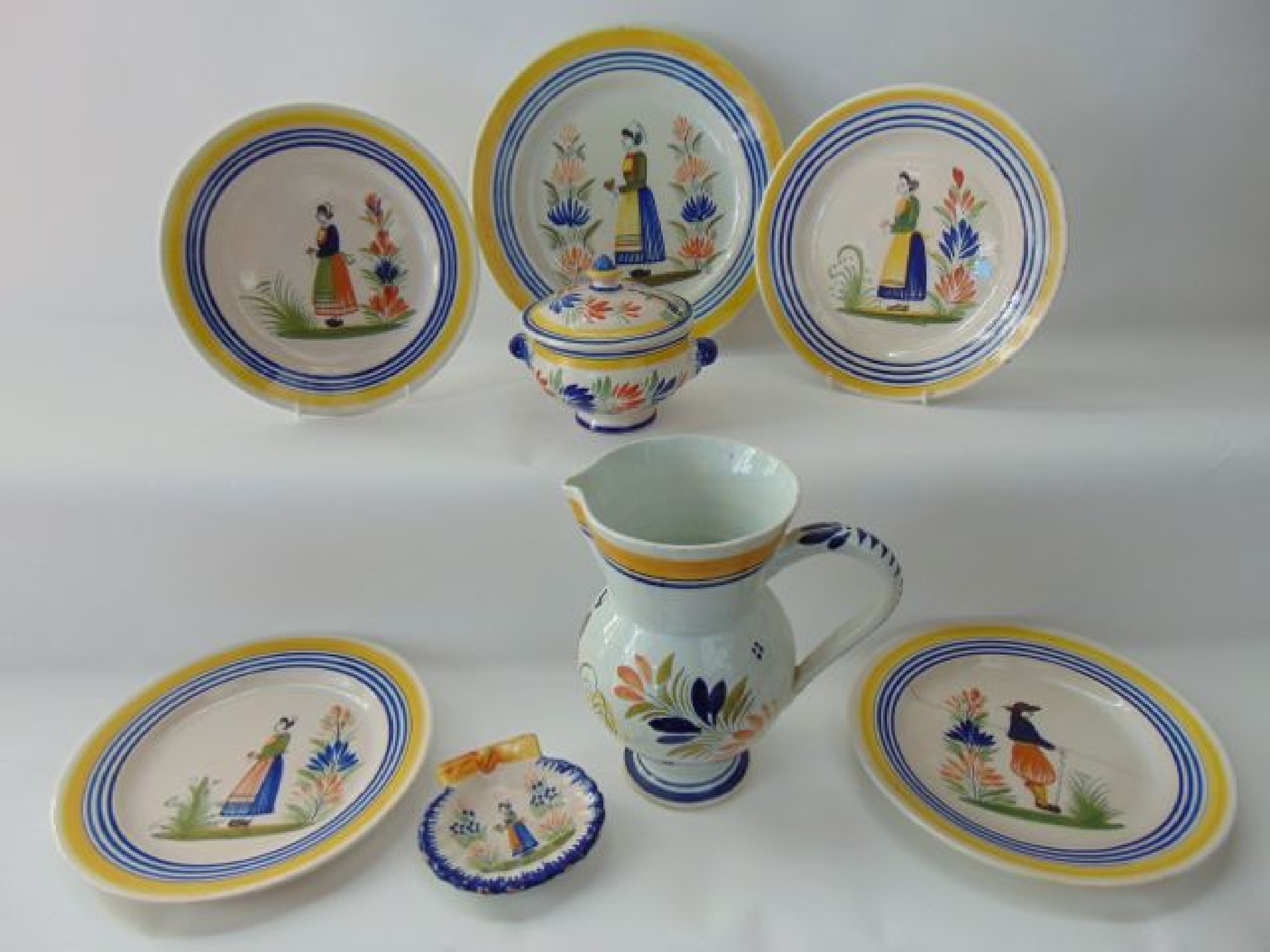 Appraisal: A collection of French Quimper tin glazed earthenware with painted