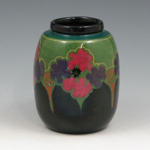 Appraisal: Gouda cabinet vase with colorful floral design Marked GOUDA Two