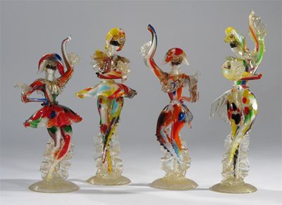 Appraisal: A pair of Murano Carnival figures each with elaborate multi