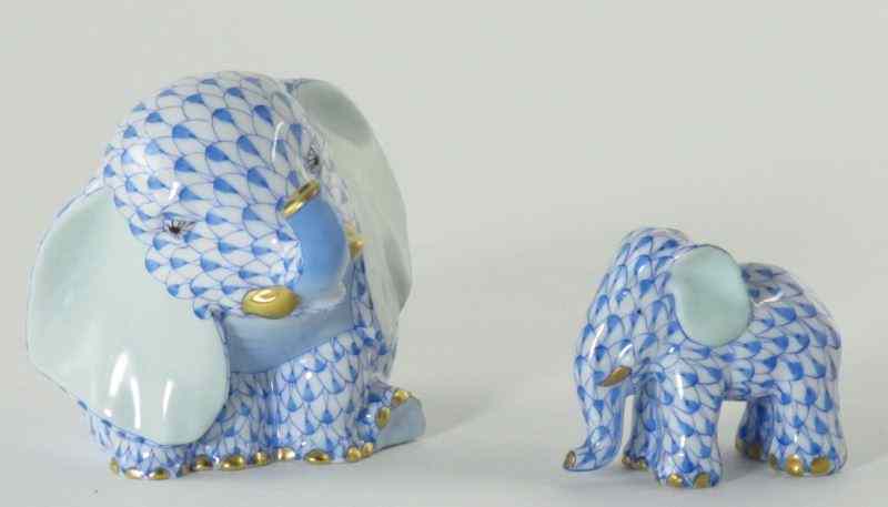 Appraisal: Two Herend Elephantsboth of hand painted blue fishnet motif the