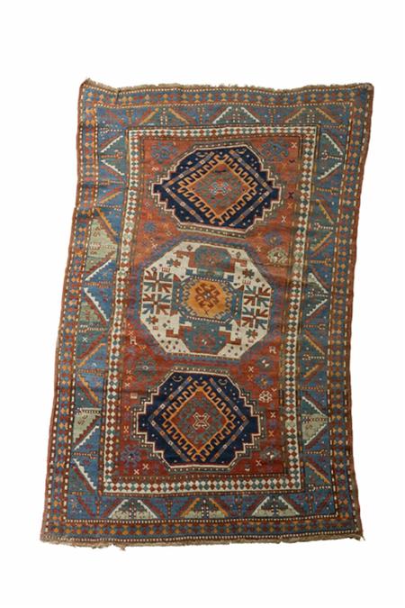 Appraisal: A Kazak rug late th early th century the red