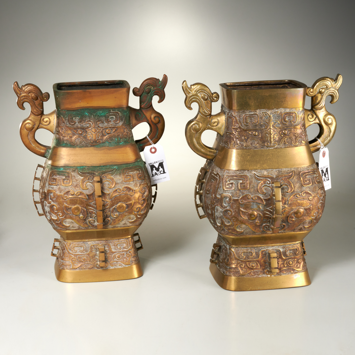 Appraisal: PAIR CHINESE ARCHAIC STYLE BRONZE VESSELS th c h x