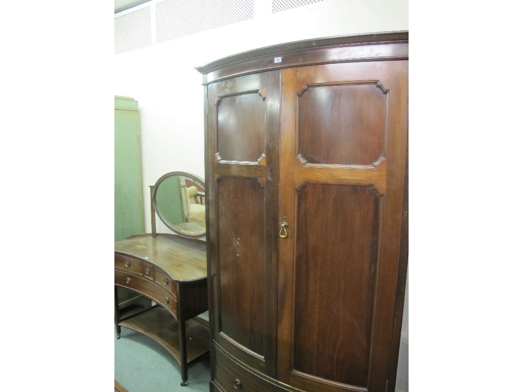 Appraisal: Mahogany two door wardrobe with a matching dressing chest