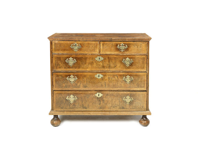 Appraisal: A Queen Anne walnut and featherbanded chest the rectangular ogee