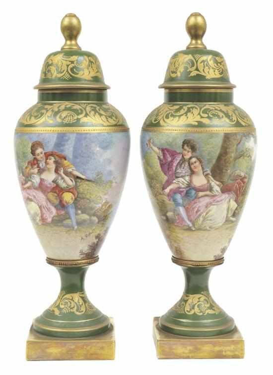 Appraisal: A PAIR OF SEVRES STYLE PORCELAIN LIDDED URNS SIGNED A