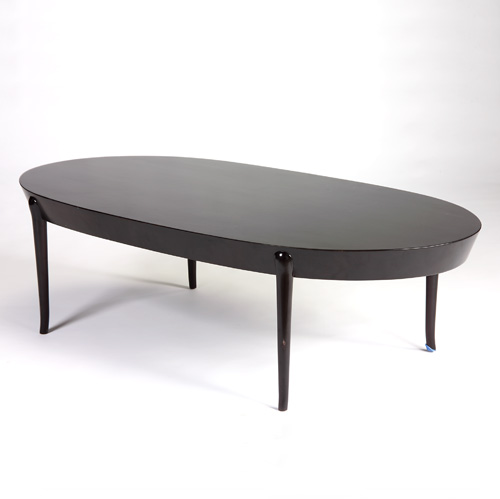 Appraisal: T H ROBSJOHN-GIBBINGS WIDDICOMB Coffee table with oval top broad