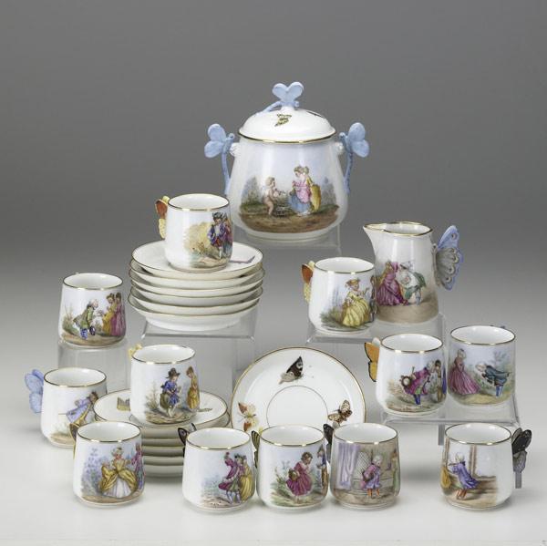 Appraisal: CONTINENTAL PORCELAIN PARTIAL TEA SET Transfer decorated with dragonfly and