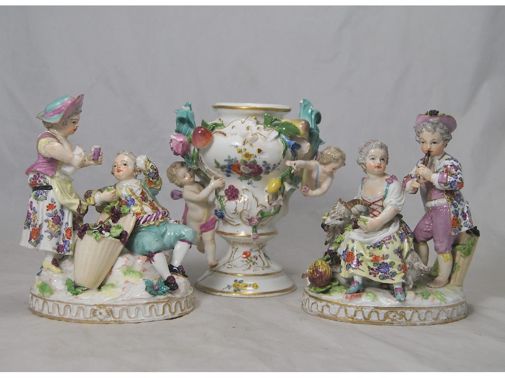 Appraisal: A pair of German porcelain small figure groups of th