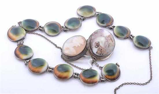 Appraisal: AN OPERCULUM BRACELET AND NECKLACE WITH TWO CARVED CAMEO BROOCHES