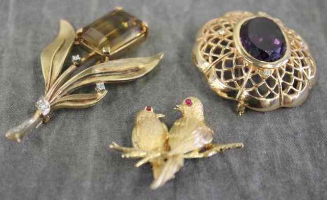 Appraisal: Three kt Yellow Gold Brooches with Stones kt flower brooch