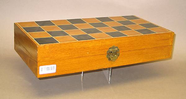 Appraisal: A pieced and tinted ivory chess set and wood storage