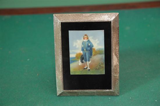 Appraisal: MINIATURE PORTRAIT PAINTING Depicting a boy dressed in blue A