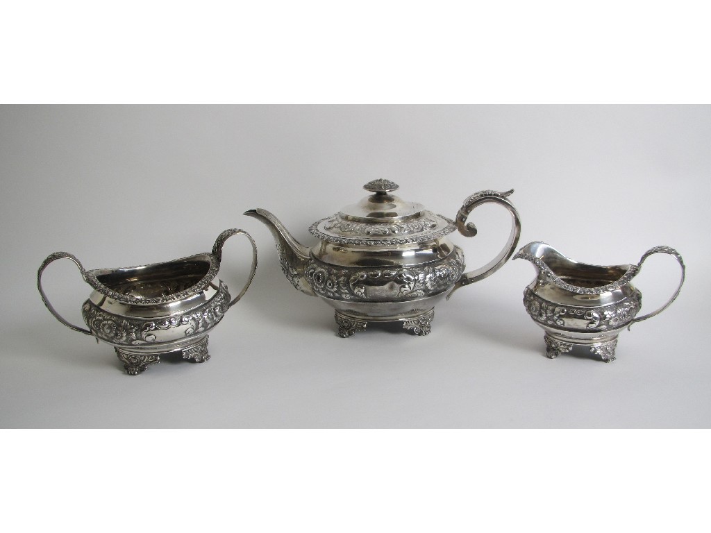 Appraisal: A George IV silver three piece tea service embossed with