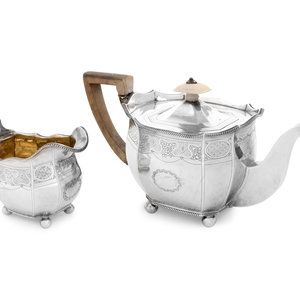 Appraisal: A George III Silver Teapot and Creamer London th th