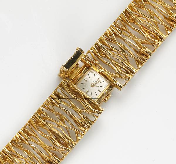 Appraisal: A Bucherer eighteen karat gold branch motif bracelet wristwatch with