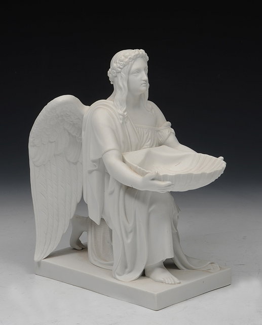 Appraisal: A ROYAL COPENHAGEN BISQUE MODEL OF AN ANGEL holding a