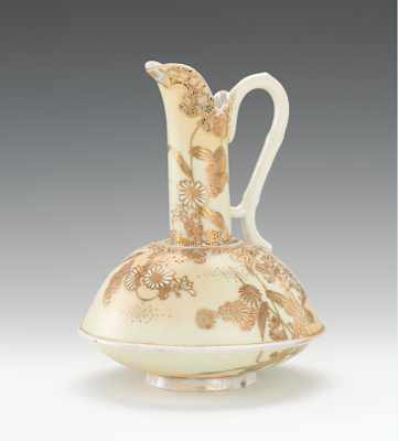 Appraisal: A Nippon Porcelain Moriage Ewer Decorated in pale yellow with