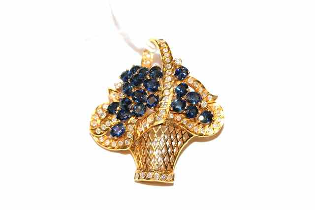 Appraisal: A SAPPHIRE AND DIAMOND SET BROOCH in the form of