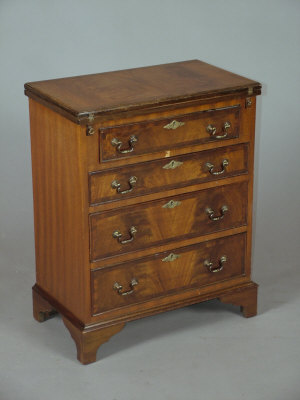 Appraisal: A mahogany bachelors chest of drawers mid th century the