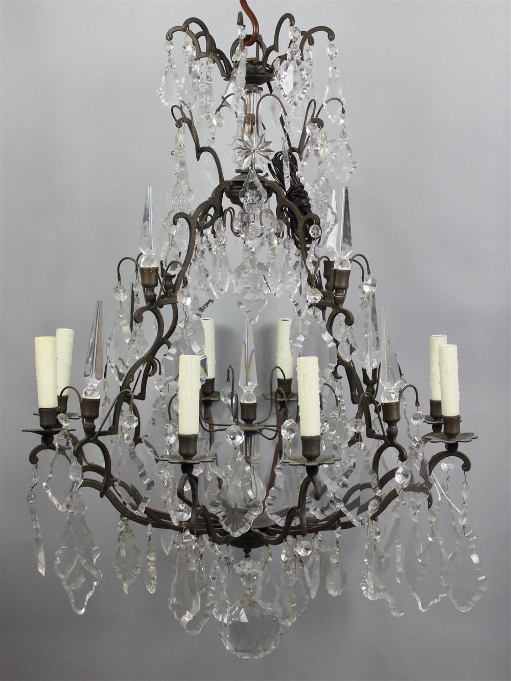 Appraisal: LOUIS XV STYLE BRASS AND CRYSTAL EIGHT LIGHT CHANDELIER TWO