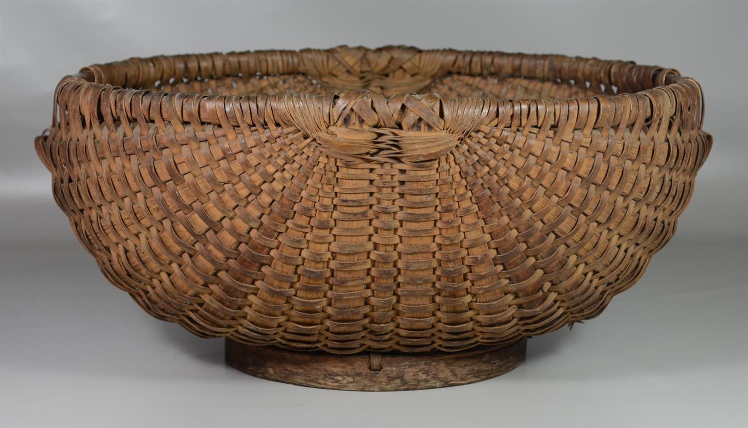 Appraisal: Large Oval Basket with wooden base l x w x