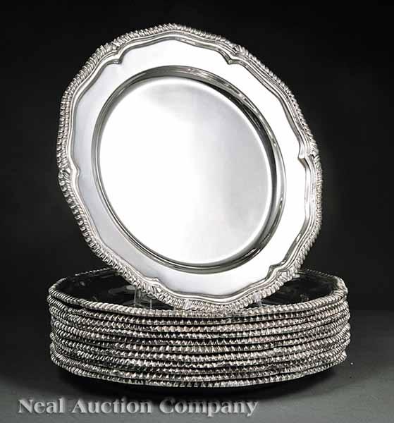 Appraisal: A Set of Twelve English Silverplate Service Plates marked Royal