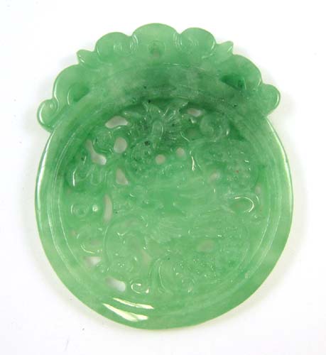 Appraisal: CHINESE GREEN JADE PENDANT the large green jade carving measures