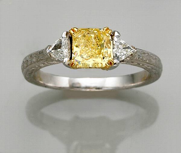 Appraisal: A natural fancy color diamond diamond and eighteen karat gold