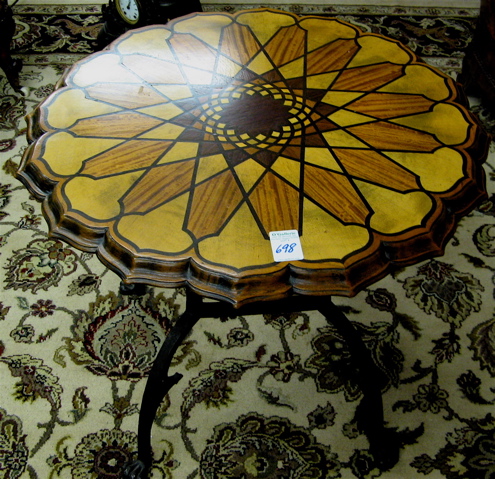 Appraisal: AN INLAID WOOD AND CAST IRON WINE TABLE American mid-