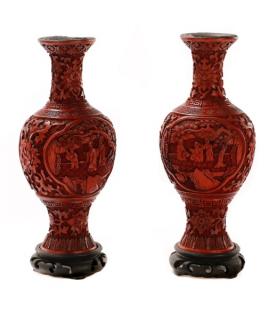 Appraisal: Pair of Chinese Cinnabar Vases w Wood Stands Chinese late