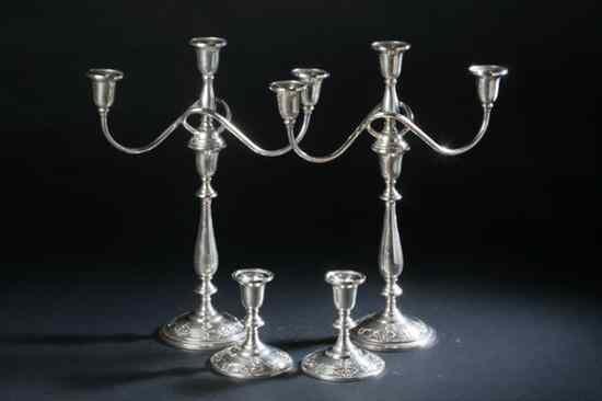 Appraisal: TWO PAIR INTERNATIONAL STERLING SILVER CANDLESTICKS ''Queen's Lace'' pattern Including