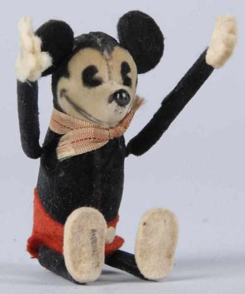 Appraisal: Felt-Covered Disney Schuco Somersault Mickey Toy Description German Working Very