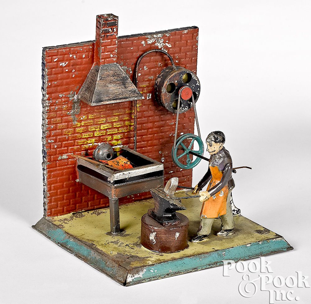 Appraisal: Blacksmith shop steam toy accessory Unusual painted tin blacksmith shop