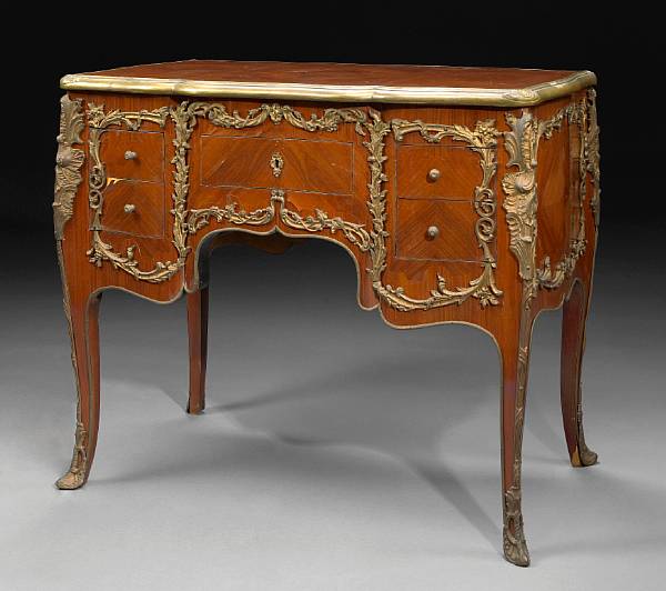 Appraisal: A Louis XV style gilt bronze mounted walnut chest th