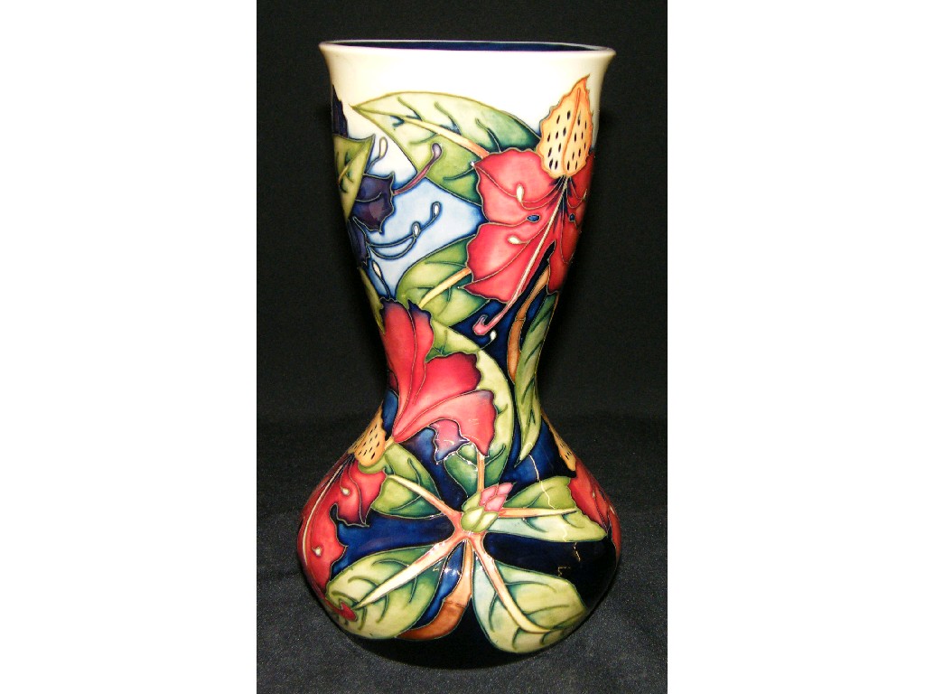 Appraisal: Modern Moorcroft vase with tube line orchids upon a mottled