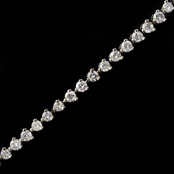 Appraisal: A diamond and eighteen karat white gold line bracelet set