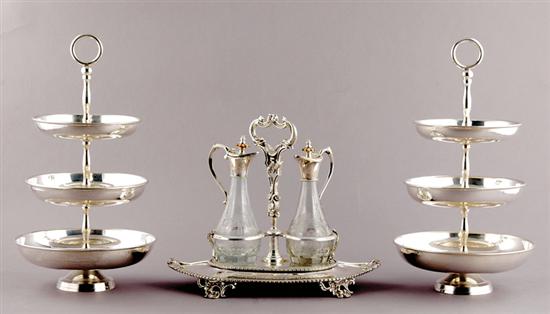 Appraisal: Silverplate dessert stands and cruet set pair three-tiered dessert stands