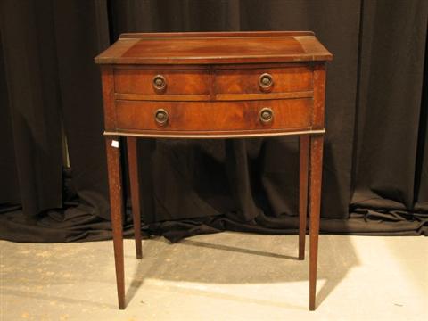 Appraisal: HEPPLEWHITE STYLE MAHOGANY SIDE TABLE With three drawers raised on