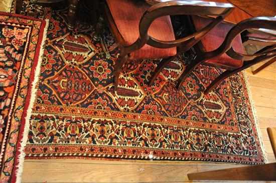 Appraisal: A PERSIAN RUG IN RED CREAM BLUE AND PINK TONES