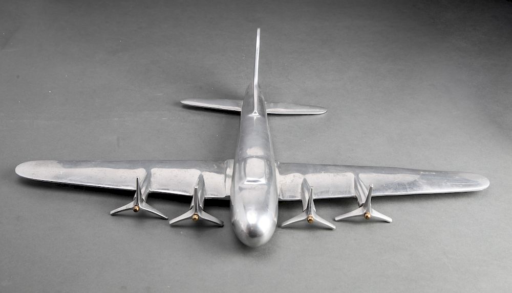 Appraisal: Mid-Century Aluminum Airplane Sculpture Mid-century modern aluminum airplane model sculpture